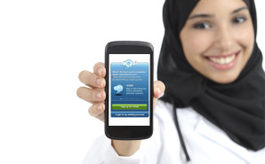 Nurse in hijab with mobile phone